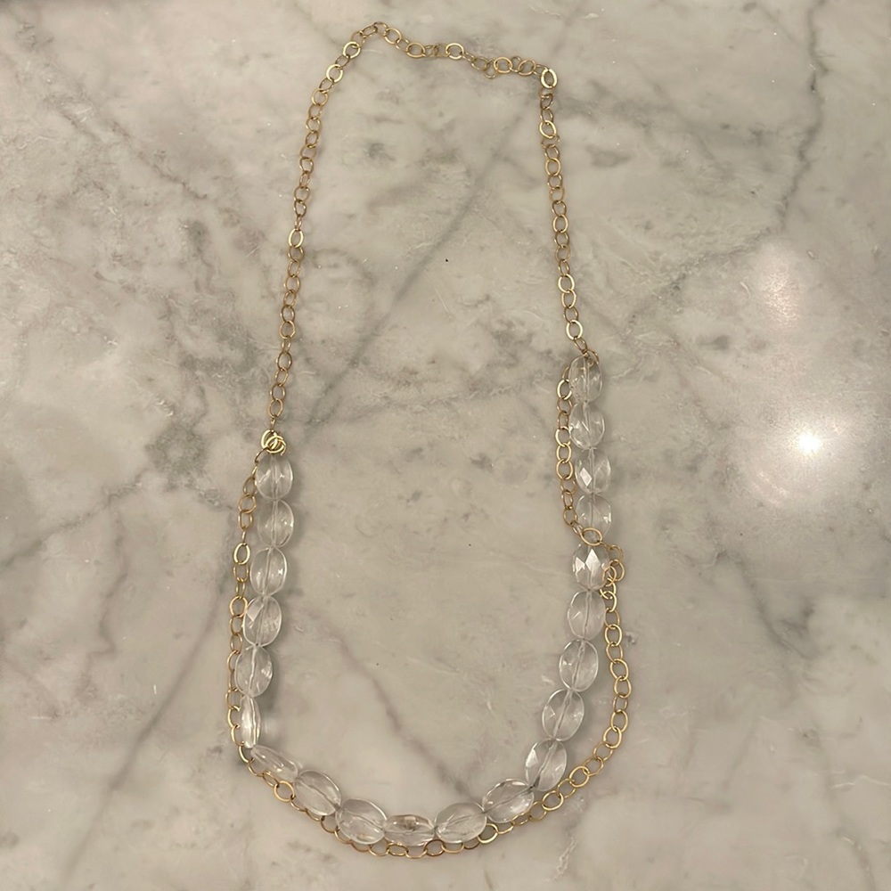 Clear glass beaded necklace with gold plated chains. Wear multiple ways.